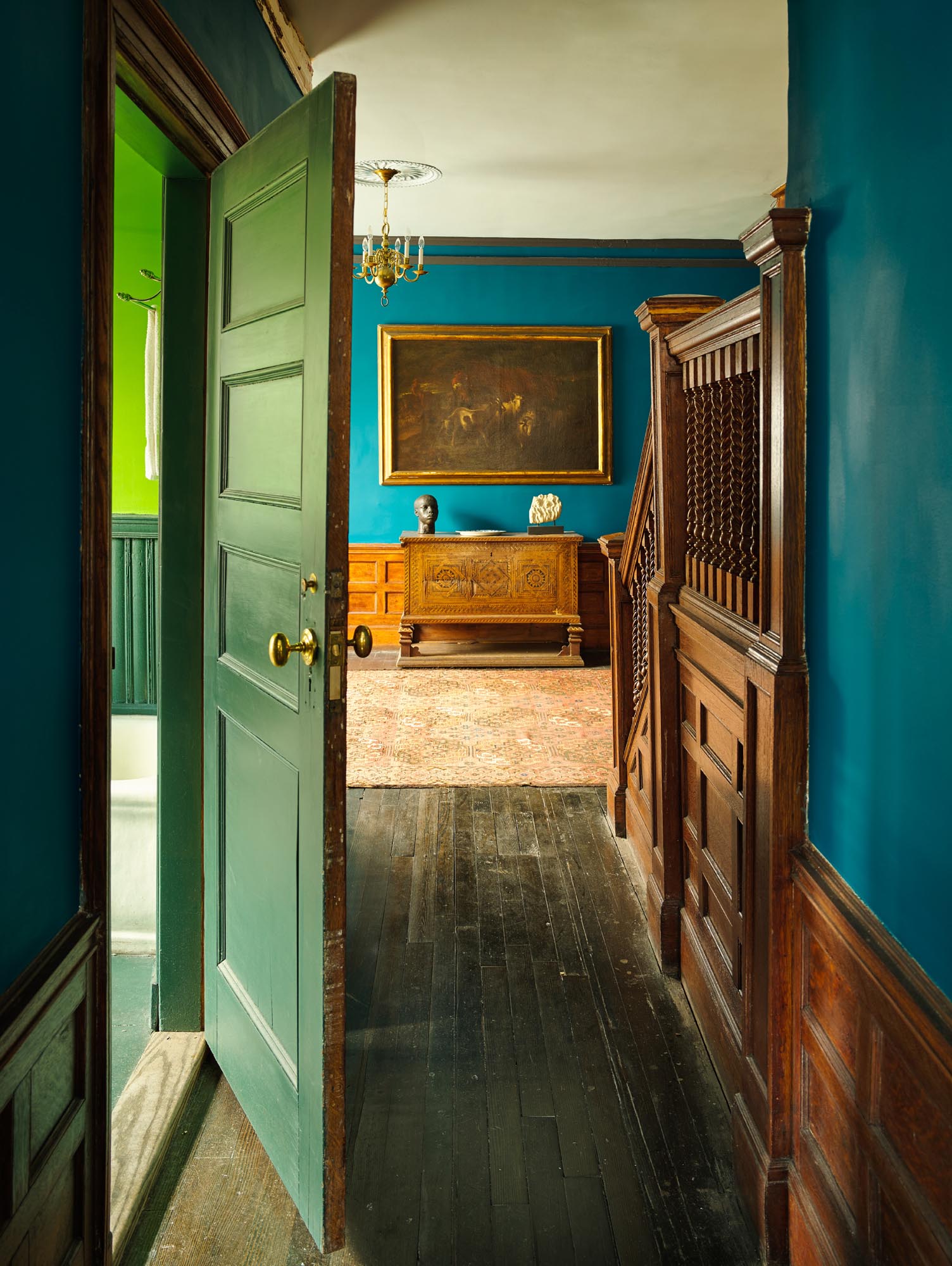 Photo of green bathroom.