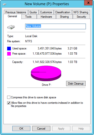 A screen shot of a disk’s Properties dialog box, showing compression options on the General tab. The capacity is shown graphically as a disk with free space, and used space is shown by color. This information is also presented as bytes, gigabytes, and terabytes.